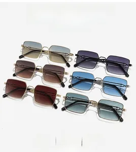 Detail of square metal sunglasses with unique chain-link temples and gradient lenses