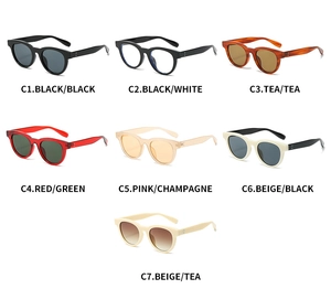 Detailed display of vintage round sunglasses in seven stylish color variations