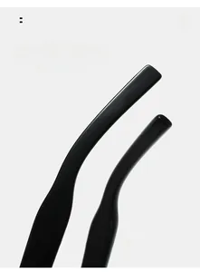 Close-up of sleek black curved mirror legs on oval frame glasses for ergonomic comfort