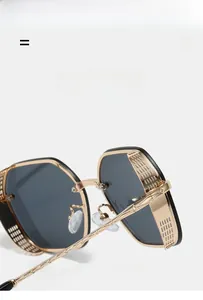 Detail of vintage geometric sunglasses showing hollow metal shield and textured temple arm