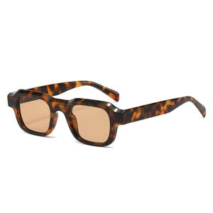 Retro square tortoiseshell sunglasses with translucent amber lenses in a side view