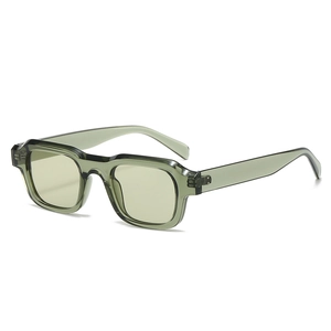Stylish square frame sunglasses in translucent jelly green with matching light tint lenses
