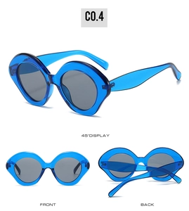 Three-angle view of oval royal blue oversized sunglasses with translucent frames