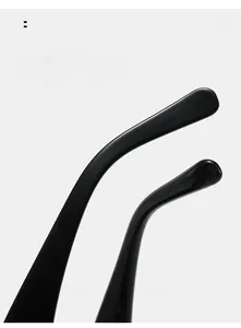 Detail of curved ergonomic sunglasses legs with sleek black glossy finish