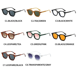 Selection of eight vintage oval sunglasses and glasses frames in various colors