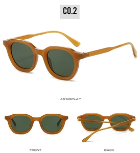 Three-view display of vintage oval sunglasses with amber frames and dark green lenses