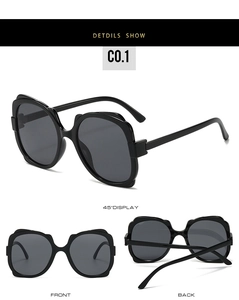 Detailed multi-angle views of black cat-eye oversized sunglasses with dark lenses