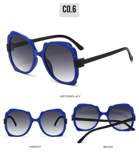 Three-angle view of butterfly sunglasses with blue frames and gradient grey lenses