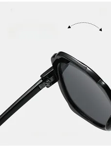 Macro detail of high-durability texture hinge on black butterfly frame sunglasses