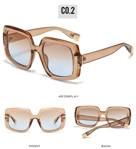 Square brown gradient sunglasses with golden metal accents and transparent frame details
