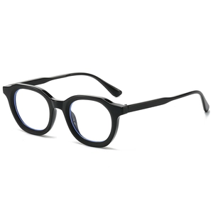 Retro oval sunglasses with black frames and blue light blocking lenses in 45-degree view