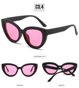 Detailed views of oversized cat eye sunglasses with matte black frames and pink lenses