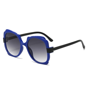 Stylish butterfly shaped sunglasses with blue frames and black gradient lenses for outdoors