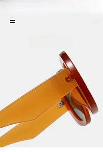Detail of high-elasticity hinge and amber polymer frame on oval sunglasses