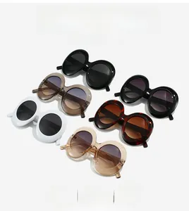 Detailed grid of oversized oval sunglasses in various colors like black and tortoiseshell