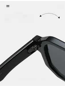 Close-up of durable reinforced metal hinges and screw details on large frame sunglasses