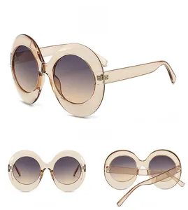 Three-view display of champagne oval sunglasses with gradient lenses in a vintage style