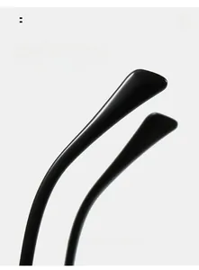 Close-up of curved black eyeglass temples with a smooth polished finish for comfort