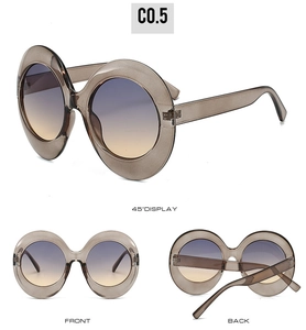 Three-view display of oversized oval sunglasses with beige frames and gradient lenses