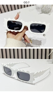 Close-up of white irregular scalloped sunglasses with dark lenses for women