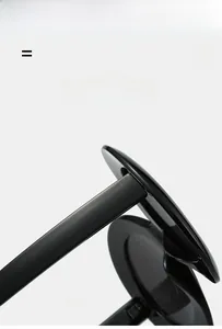 Detail of high-gloss lightweight black frame sunglasses with durable elastic hinge