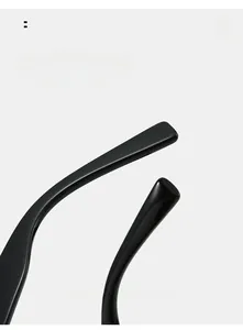 Detail view of the ergonomic curved mirror legs on these oversized oval sunglasses