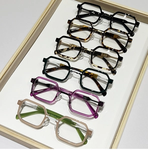 Detailed view of assorted hexagon eyewear frames displayed in various trendy colors