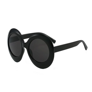 Retro oversized oval sunglasses with thick black frame and dark lenses for hip hop style