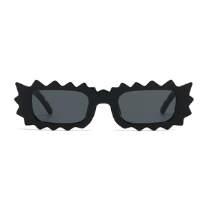 Women's black irregular scalloped sunglasses with a chunky frame and edgy punk Y2K aesthetic