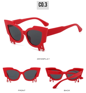 Red cat-eye sunglasses with teardrop rhinestone accents in front, back and side views