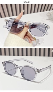 Detail view of transparent purple sunglasses frames with elegant metal rivet hinges