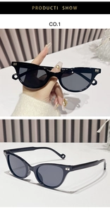 Close-up of black cat-eye sunglasses with silver B logo on corners and clear lens details