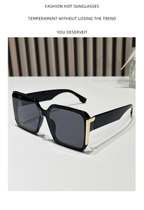 Detailed view of square frame sunglasses featuring premium gold metal temple hinges