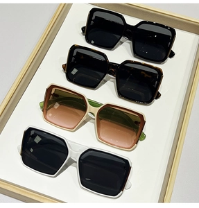 Collection of square frame sunglasses in black, tortoise shell, white and bicolor styles