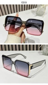 Detail view of square sunglasses featuring blue-pink gradient lenses and gold metal hinges