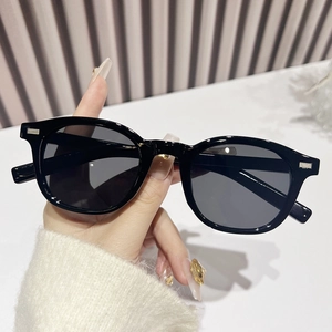 Classic oval leopard print sunglasses with silver metal studs and dark UV lenses