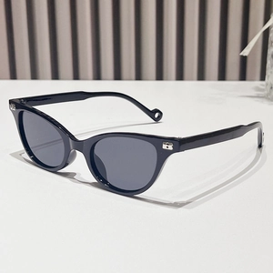Fashionable black cat-eye sunglasses with metal accents and sleek dark polarized lenses
