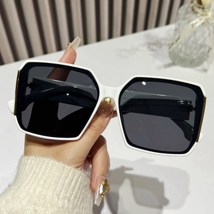 Retro oversized square sunglasses with white frame, grey lenses and gold heart detail