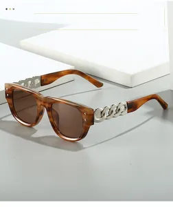 Detail of tortoise shell square sunglasses with fashion silver metal chain temples