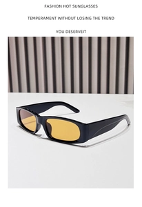 Détail de lunettes de soleil rectangulaires rétro avec monture noire et verres jaunes