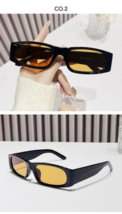 Vue détaillée de lunettes de soleil rectangulaires vintage avec monture noire et verres