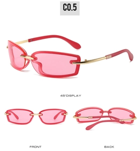 Detail view of pink rectangular rimless sunglasses with gold metal temples and multi-angles