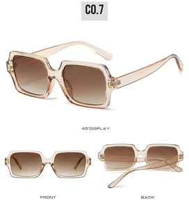 Detail view of square vintage sunglasses with champagne frames and gradient brown lenses