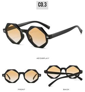 Detailansicht der polygonalen Sonnenbrille mit schwarzem Rahmen und orangefarbenen Gläsern