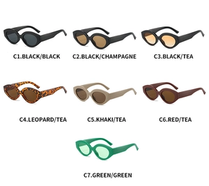 Flat lay of retro oval cat eye sunglasses in black, leopard, khaki and green colors