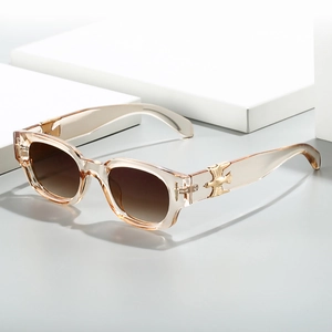 Lunettes de soleil carrées champagne avec aigles dorés et verres dégradés marron