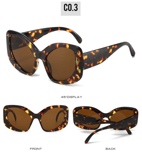 Three views of vintage oversized tortoise sunglasses with dark brown lenses and C0.3 frame