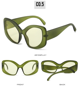 Three-way view of oversized Y2K sunglasses with dark green matte frames and yellow lenses