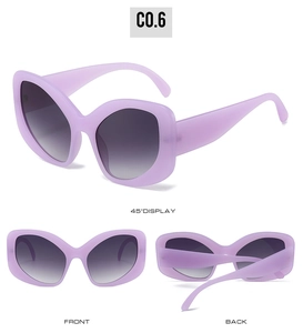 Multiple views of Y2K oversized cat-eye sunglasses with purple matte frames and gradient lenses