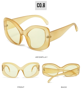 Three-angle display of Y2K butterfly sunglasses with translucent beige frames and lenses